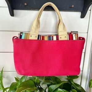 TIANNL, RED CANVAS HANDBAG WITH STRIPED ACCENT. 3 LARGE POCKETS.